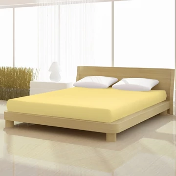 Krémsárga színű pamut elasthan de luxe gumis lepedő 180/200x200/220 cm-es matracra